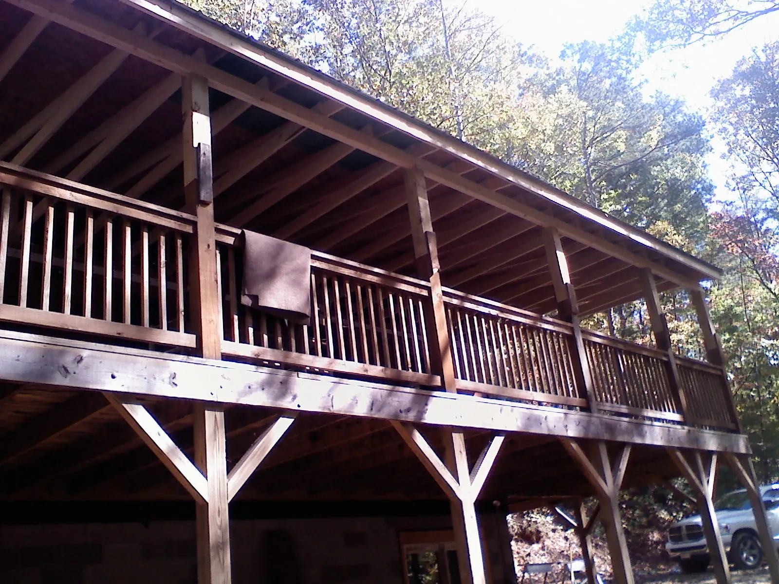 Timber framing under a new elevated porch and deck — Roof Leak Repair in Liberty Lake by Roofing Brothers
